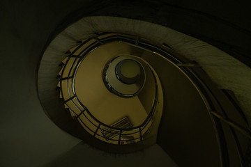 Fototapeta premium The spiral staircase detail in a beautiful of the building.