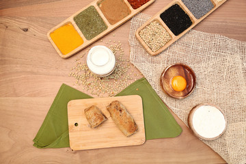 Patty with milk on the wooden table