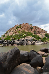 tungabhadra river and stones in hampi