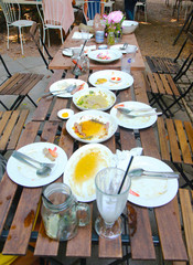 After the party.The dish was placed empty on the table after the celebration. 