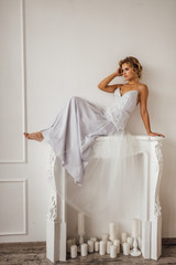 bride in beautiful dress in white Studio