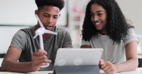 High school students studying renewable energy