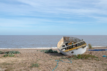 Fototapeta na wymiar Old Fishing Boat on Sizewell Beach, Suffolk, England
