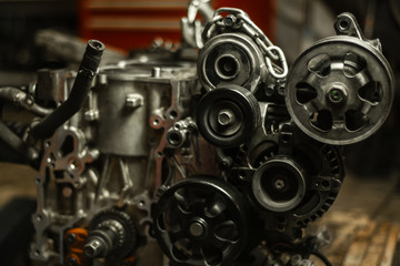 Fototapeta na wymiar car engine pulleys, engine repair