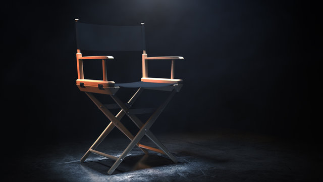 Director Chair, Movie Clapper and Megaphone in the volumetric light on a black background. 3d Rendering