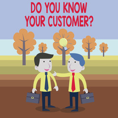 Text sign showing Do You Know Your Customer Question. Business photo text Have into account client likes opinion Two White Businessmen Colleagues with Brief Cases Sharing Idea Solution