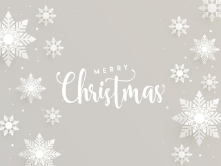 Naklejka na ściany i meble Stylish text of Merry Christmas and snowflakes decorated background. Can be used as greeting card or poster design.