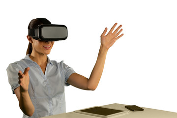 Young businesswoman using a VR headset