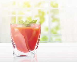 Glass of alcohol  cocktail on background