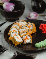 Fried sushi with ginger and wasabi