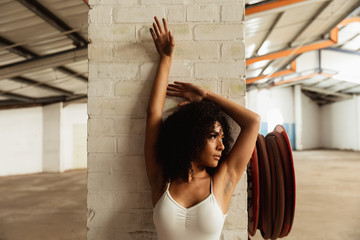 Female dancer in an empty warehouse