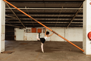 Female dancer in an empty warehouse