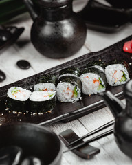 Black sushi set on the table