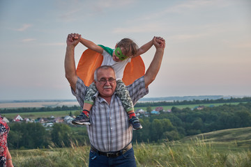 grandpa holding grandson. Family Relationship Between Grandfather and Grandson. Grandpa Teaching,