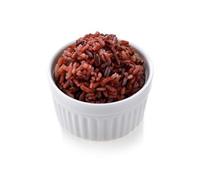 brown rice in white bowl on white background