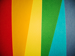 Fototapeta premium Background in the colors of the LGBT flag. Texture sheets of paper. Red, orange, yellow, green, blue, purple. LGBT Pride Flag Includes LGBT, Lesbian, Gay, Bisexual, and Transgender Flag