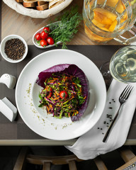 Cabbage vegetable salad with herbs and carrots