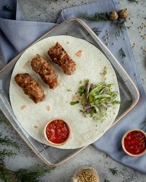 Azeri lyula on pita bread with herbs and onions