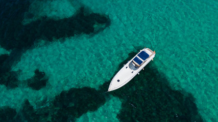Top view from Drone a ship on blue ocean