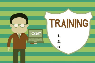 Naklejka premium Conceptual hand writing showing Training. Concept meaning An activity occurred when starting a new job project or work Man in suit wearing eyeglasses holding open laptop photo Art