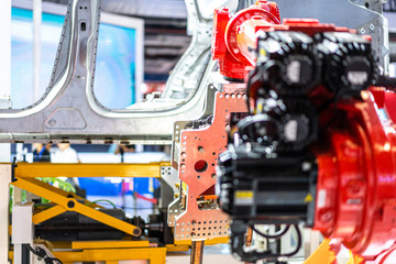 robot arm working in car factory