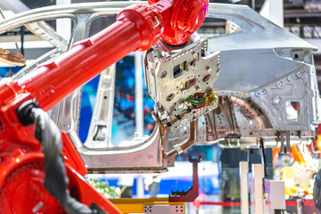 robot arm working in car factory
