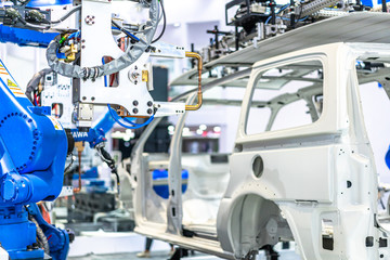 robot arm working in car factory