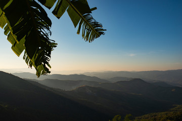landscape of mountains and hills at sunset