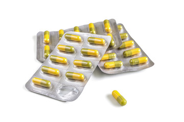 Blister packs with yellow capsules