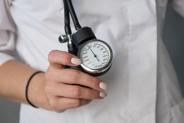 tonometer in the hands of the doctor