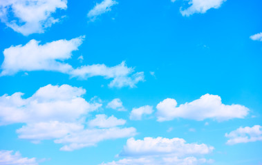 Naklejka na ściany i meble Blue sky with white heap clouds - background