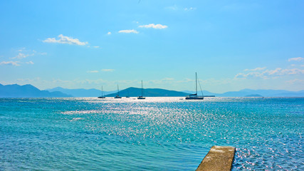 Panoramic seascape with sail yachts