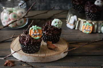 Chocolate Cupcakes with Creepy Marshmallow Sweets for Halloween Parties.