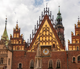 Fototapeta na wymiar Clock at the Town Hall Square in Wroclaw, Poland
