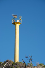 Yellow communication tower