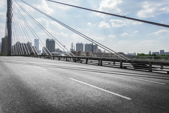 Highway Overpass Motion Blur Effect With Modern City Background