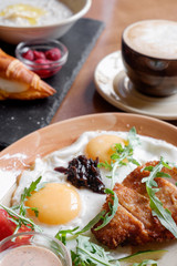 hearty breakfast fried eggs breaded vegetables