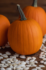 Pumpkin seeds on wood