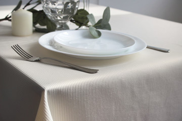 empty plate on a dining table in a restaurant, top view.