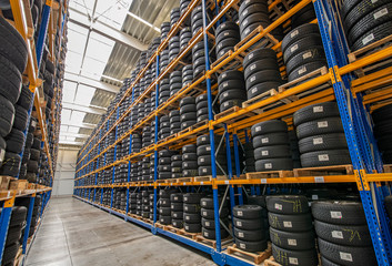 Tire warehouse with high shelf