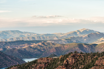 Fototapeta na wymiar Aerial view from Canyon Rim trail overlook near campground in Flaming Gorge Utah National Park with Green River at sunset