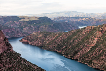Aerial colorful view from Canyon Rim trail overlook near campground in Flaming Gorge Utah National Park with Green River at sunset © Kristina Blokhin