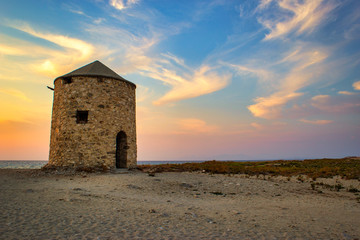 Old windmill at Agios Ioannis beach, Lefkada, Greece