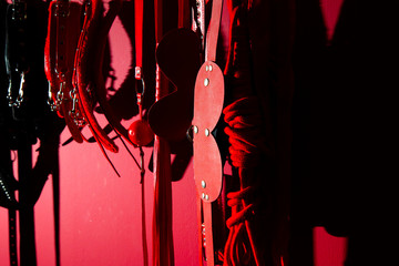erotic games and human sexuality concept. kinky sex toys for  BDSM fantasy play (ball gag, cuffs,...