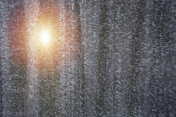 Black color plastic light filter mesh sheet with sun shine.