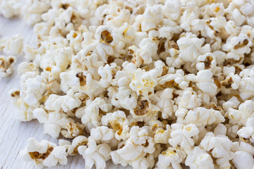 fried popcorn on a white plate, close-up