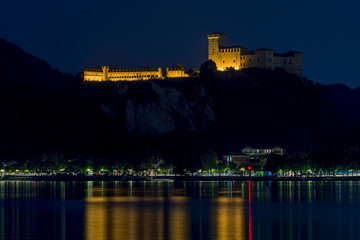 Beautiful night view of the Rocca Borromea di Angera, overlooking the Laggo Maggiore, Italy