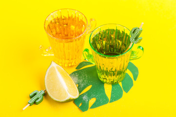 Fototapeta na wymiar tequila in cactus glass with limes