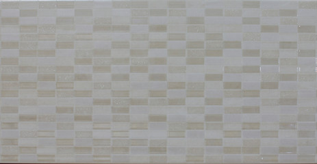 background mosaic tile of brown and beige squares of different tones and transparency monochromatic and with texture and ornament