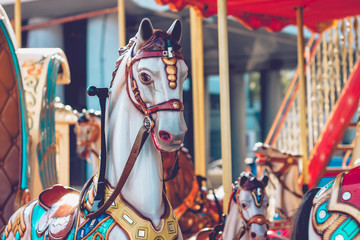 Fototapeta na wymiar Carousel horse. Fragment of a French carousel with horses